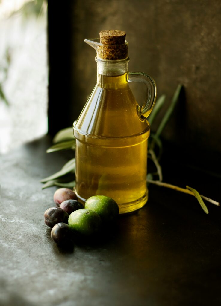 anola oil bottle on kitchen counter — the truth behind why is canola oil banned in Europe.