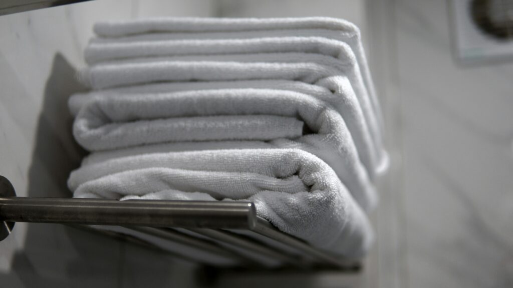 How to Get Mildew Smell Out of Towels covering musty odors, soaking, washing, odor neutralization, towel care, drying, and mildew prevention.